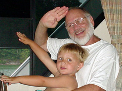 Logan with Grandad - Boat Captain