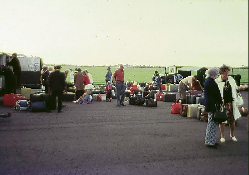 Passengers Searching Luggage 