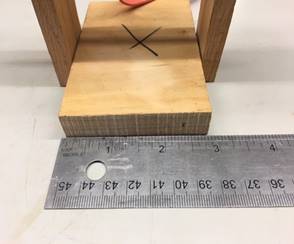 A wooden table  Description automatically generated